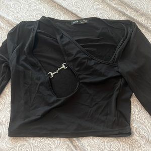 Black long sleeve cut outs going out top